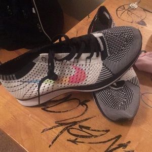 Nike “BE TRUE” flyknit racers